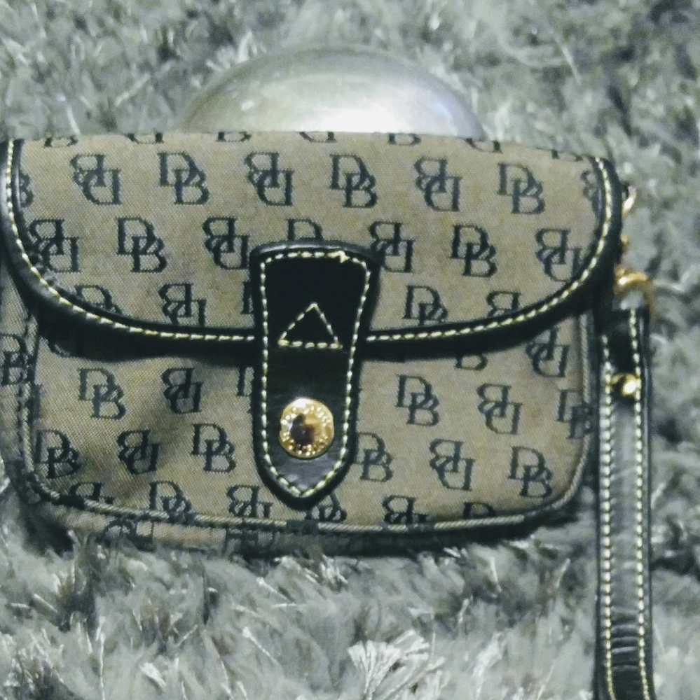 Donney & Bourke wristlet with leather trims
